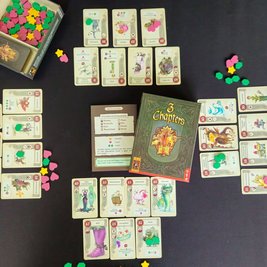 3 chapters setup, met de speelkaarten en verschillende puntentokens